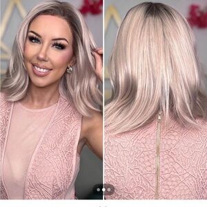 Elegant Blonde Wig for Women with a peach hue.